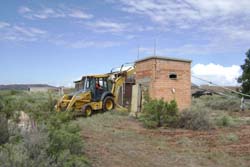 Photo of contractor removing Buildings 509 and 510.