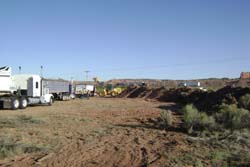 Photo of contractor removing debris piles from Parcel 12.