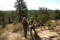 Mike Scoville and Edward Wemytewa inspecting parcel 1 fence.